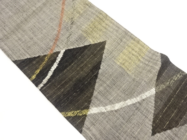 手織り紬紙布すくい織三角に曲線模様織出し袋帯